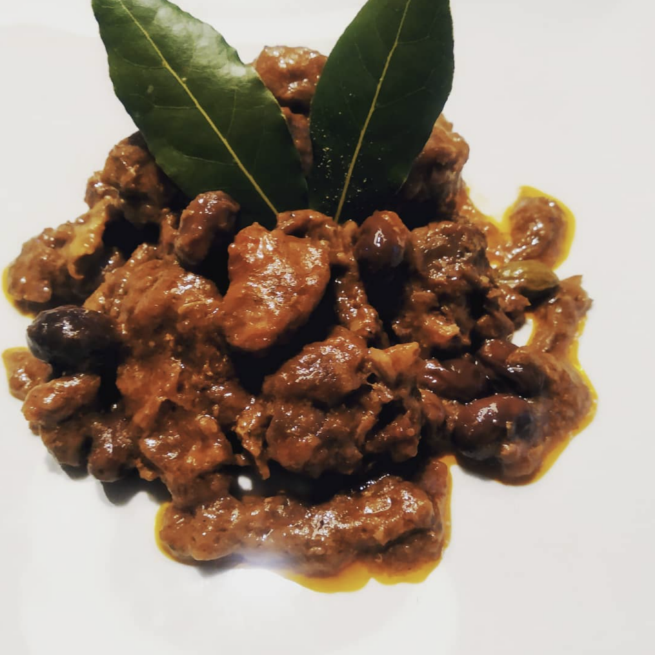 Wild Boar with local olives in tomato sauce